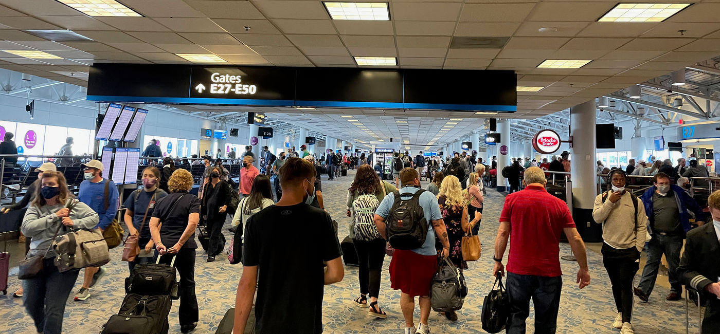 Image: Passengers moving through Charlotte Douglas International Airport. (photo by Patrick Clarke)