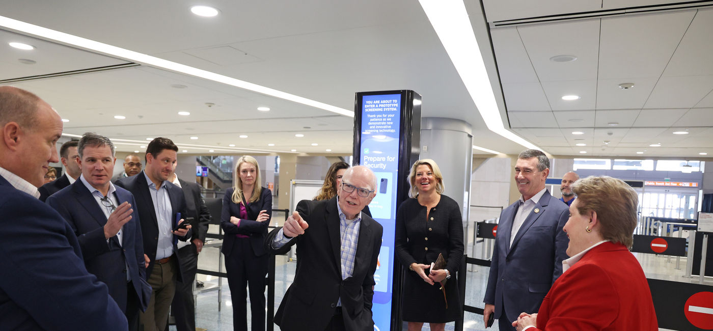 Image: Commission member Stewart Baker gestures during the field visit to Harry Reid International Airport in Las Vegas. (Photo Credit: U.S. Travel Association)