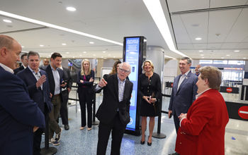 Commission member Stewart Baker gestures during the field visit to Harry Reid International Airport in Las Vegas.