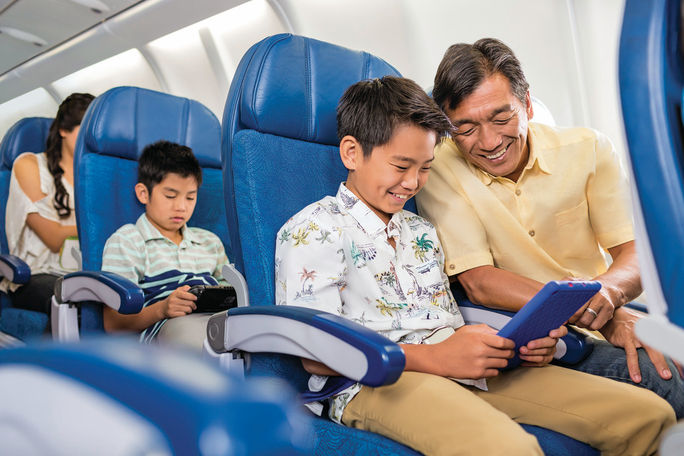 Aiplane Interior Dad and Son
