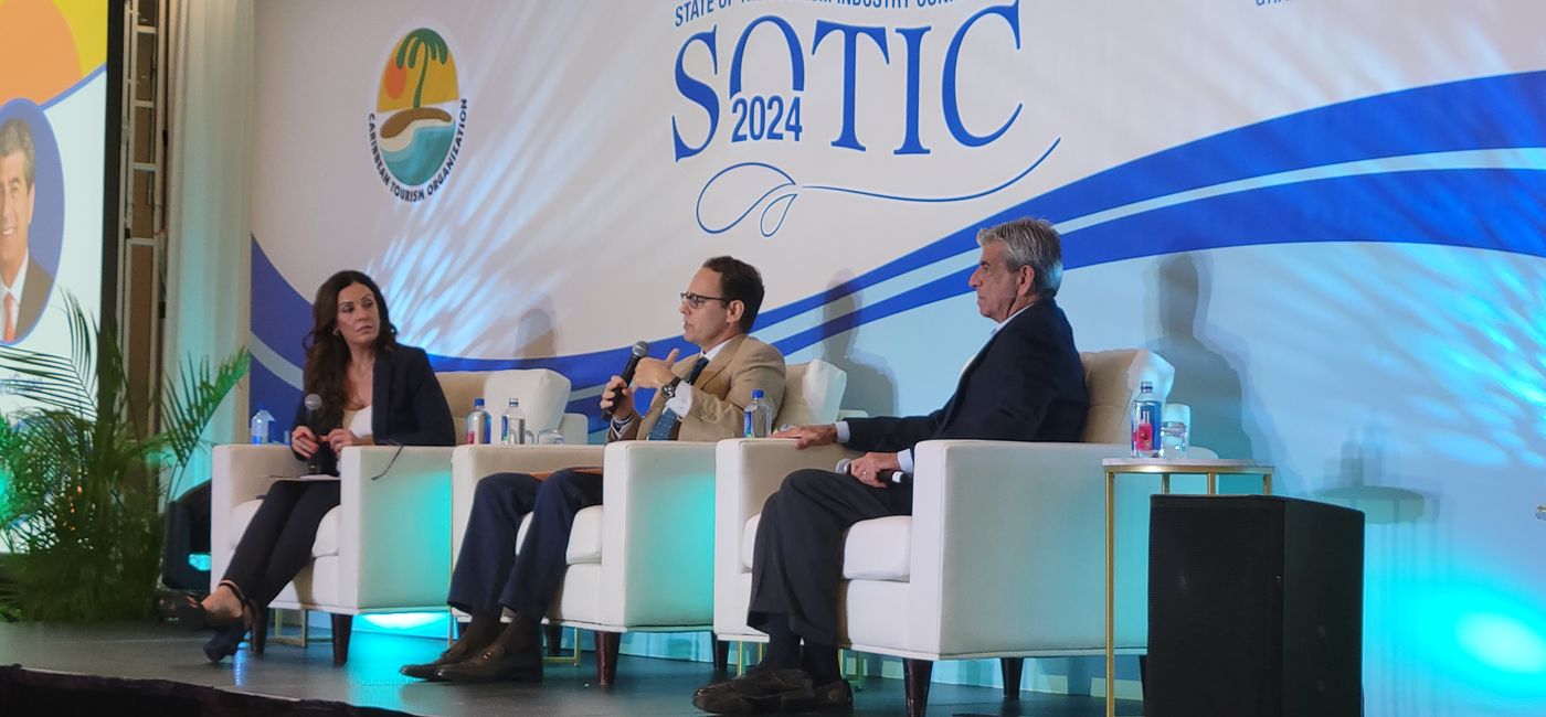 Image: David Candib of Carnival Cruise Lines (center) and Rick Sasso of MSC Cruises North America at CTO’s SOTIC conference with moderator Tammi Sulliman. (Photo by Brian Major)