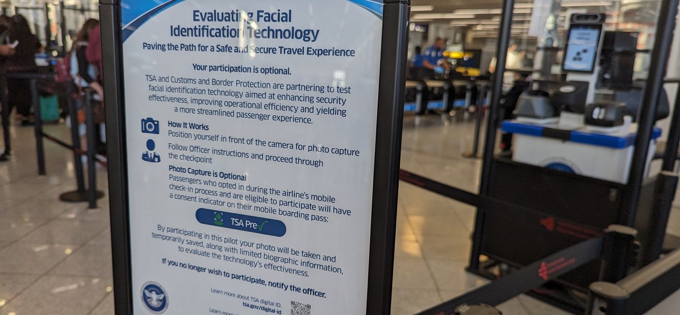 Image: Facial recognition sign at the airport (Photo Credit: Eric Bowman)