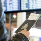 Man with Canadian passport and boarding pass