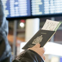 Man with Canadian passport and boarding pass