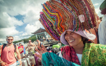 A local woman selling sarongs during G Adventures' Solo-ish Bali tour.