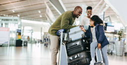 Family preparing for travel at the airport