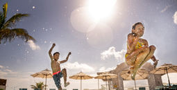 Families at the pool at Sunscape Cancun
