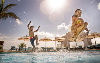 Families at the pool at Sunscape Cancun