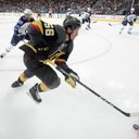 Vegas Golden Knights left wing Erik Haula (56) is chased by Winnipeg Jets defenseman Toby Enstrom (39) during Game 4 of their NHL hockey Western Conference Final game Friday, May 18, 2018, at T-Mobile Arena.
