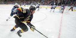 Vegas Golden Knights left wing Erik Haula (56) is chased by Winnipeg Jets defenseman Toby Enstrom (39) during Game 4 of their NHL hockey Western Conference Final game Friday, May 18, 2018, at T-Mobile Arena.