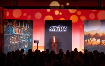 Global Travel Collection President Angie Licea welcomes attendees to ARRIVE.
