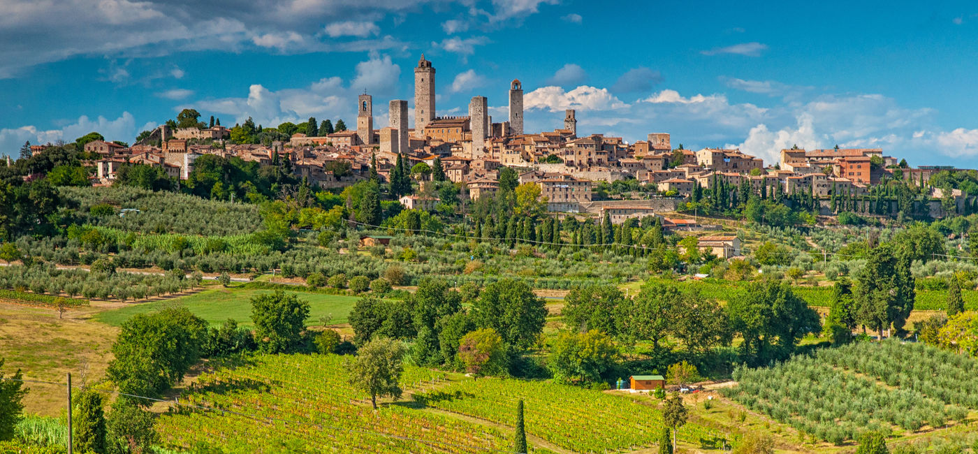 Image: Medieval town of San Gimignano in Tuscany, Italy. (Photo Credit: Adobe Stock/Horváth Botond)