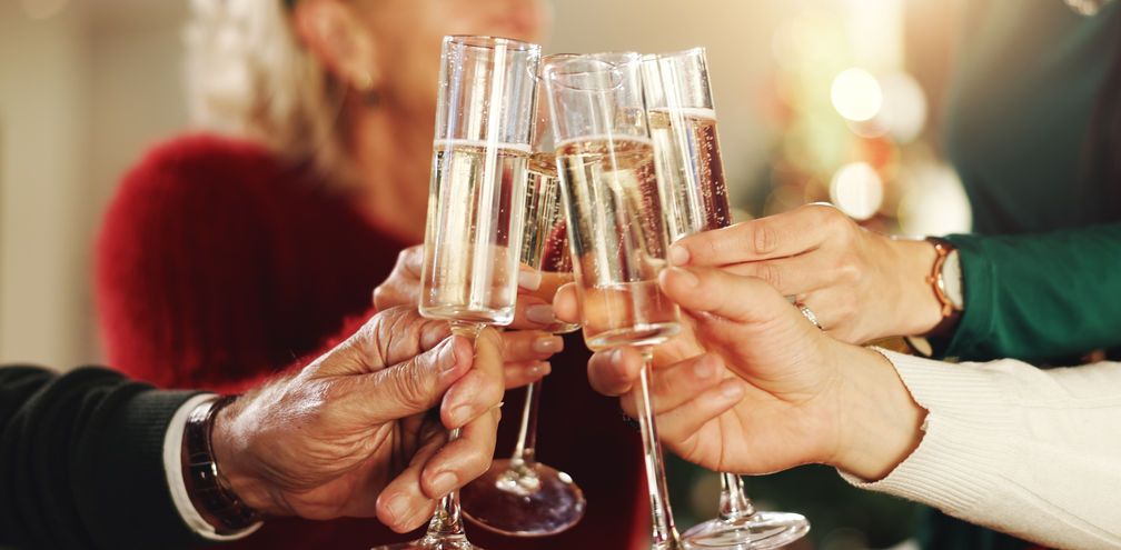 A luxury group toasting with champagne glasses during a celebration.