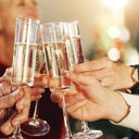 A luxury group toasting with champagne glasses during a celebration.