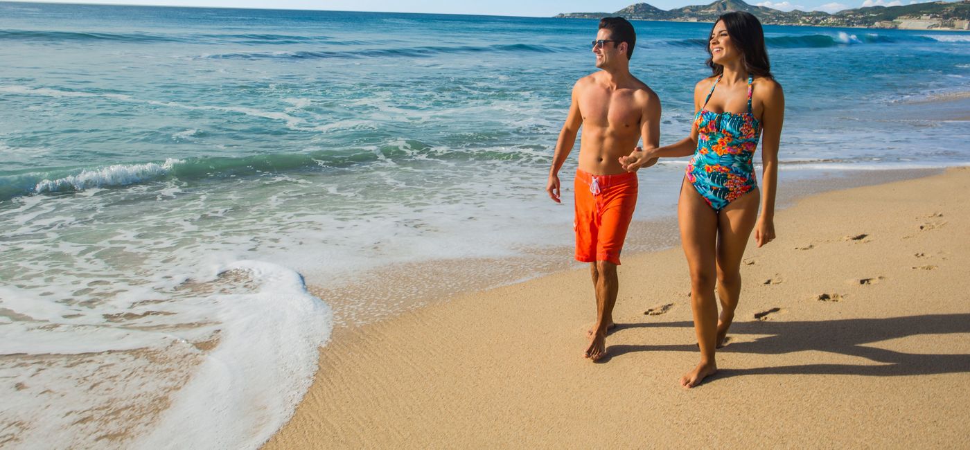 Image: Walking on the beach in Los Cabos. (photo via Playa Hotels & Resorts)