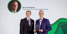 Playa's Bruce Wardinski accepts his award