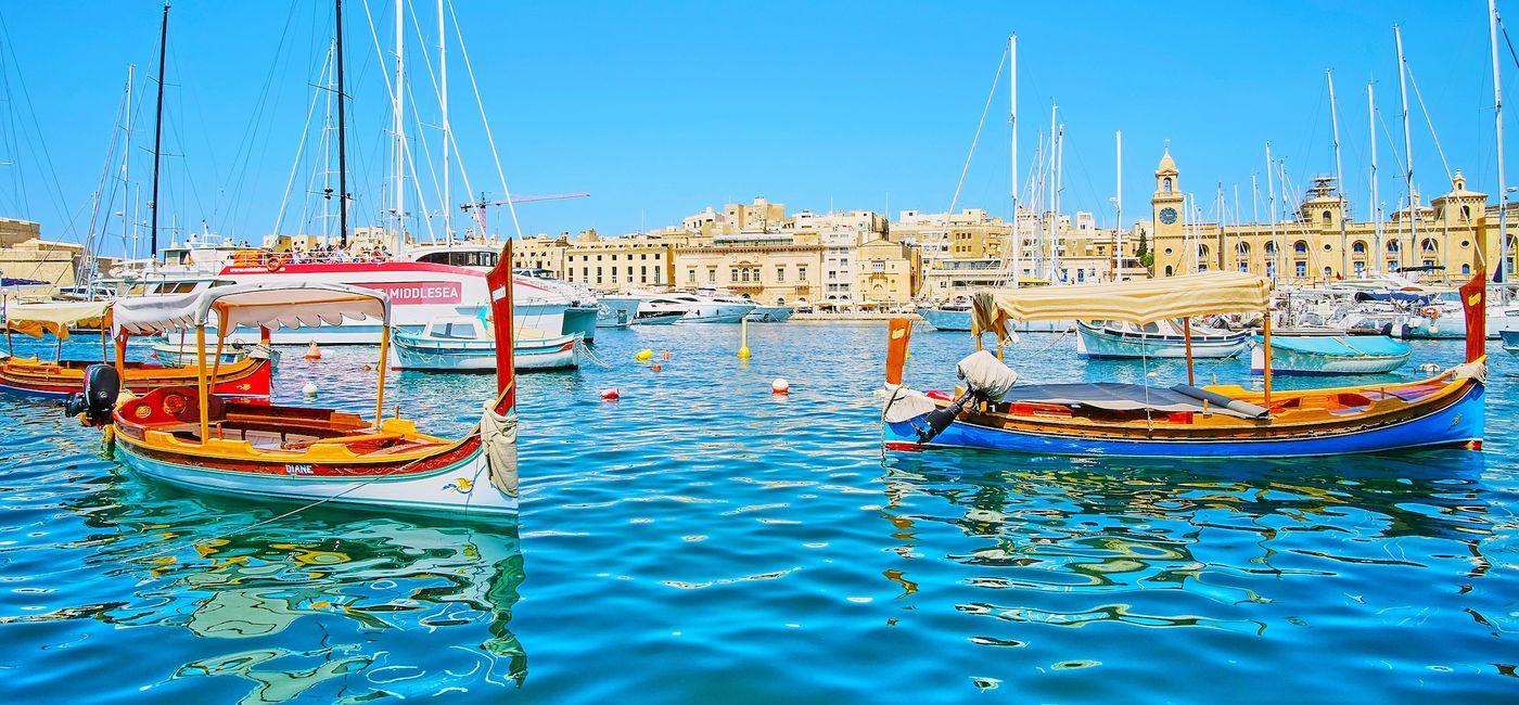 Image: Bateaux traditionnels maltais, appelés dghajsa, avec la ville de Birgu en arrière-plan (Source: Malta Tourism Authority)