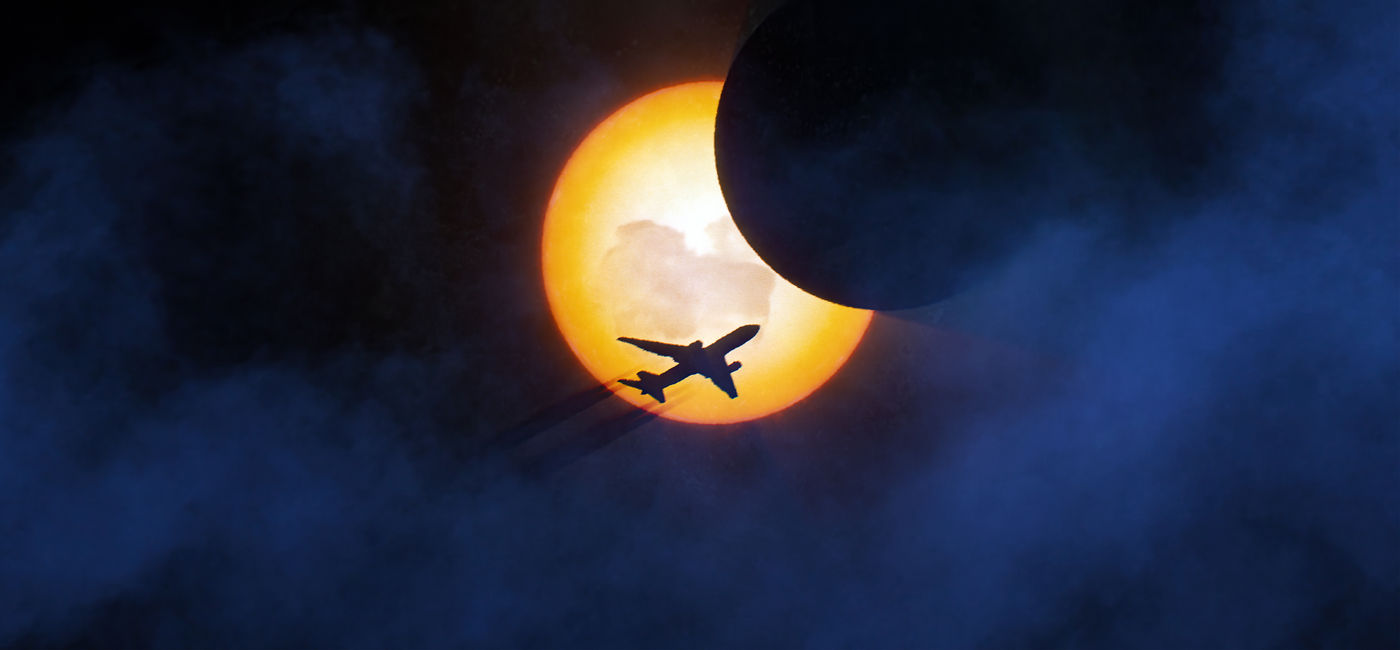 Image: Plane in flight during solar eclipse. (Photo Credit: DCPmedia/Adobe)