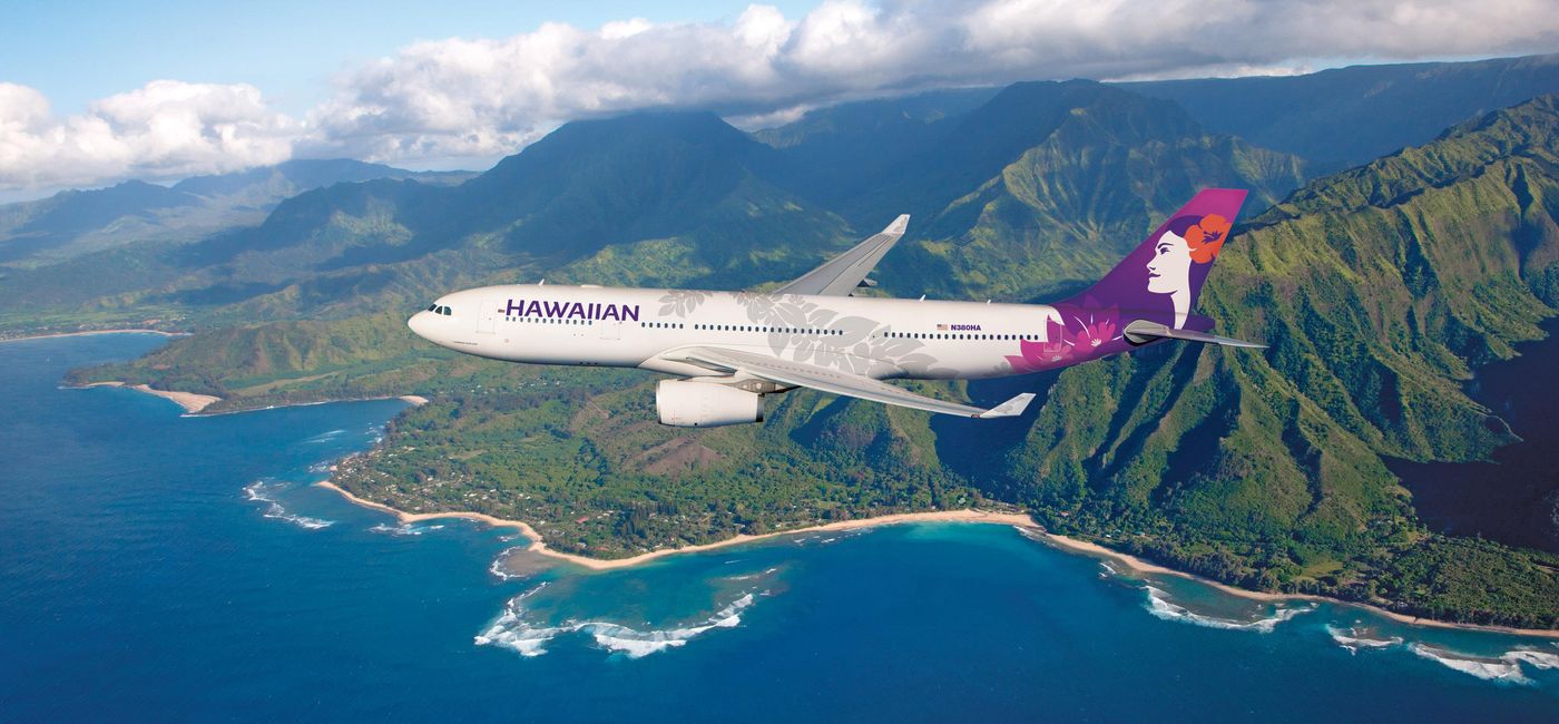 Image: Hawaiian Airlines plane over Tunnels Beach on Kauai's North Shore. (Photo Credit: Hawaiian Airlines)