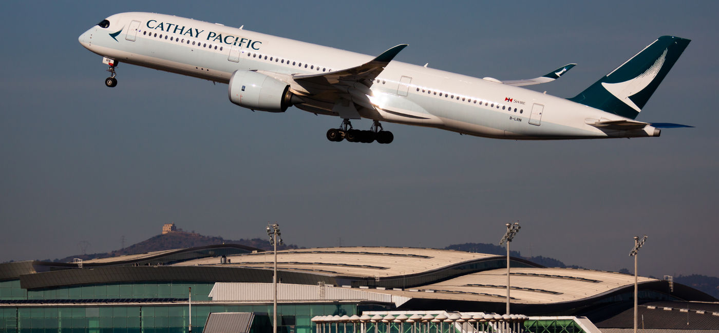 Image: Cathay Pacific Airways plane taking off (Photo Credit: JackF / Adobe Stock)