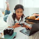 A woman booking travel with a credit card