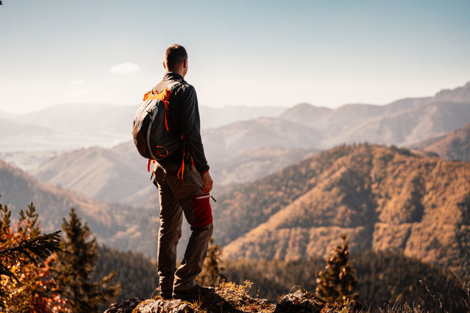 Traveler on a mountaintop