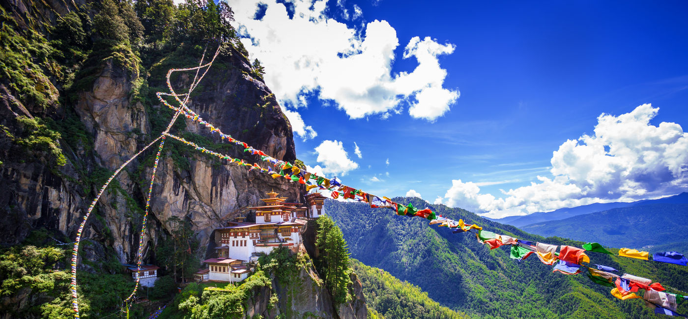 Image: Tiger's Nest Monastery in Bhutan. (Photo Credit: kardd / Adobe Stock)