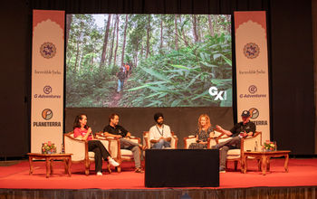 A panel session taking place at the 2024 GX Summit in Jaipur, India.