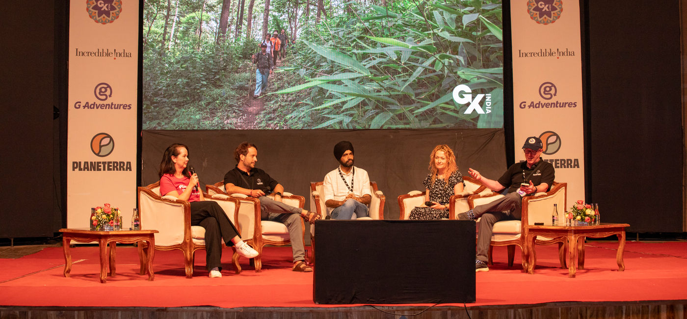 Image: A panel session taking place at the 2024 GX Summit in Jaipur, India. (Photo Credit: G Adventures)