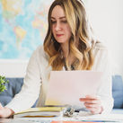 A travel advisor working on her computer.