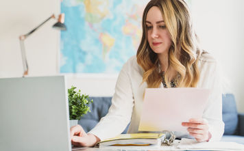 A travel advisor working on her computer.