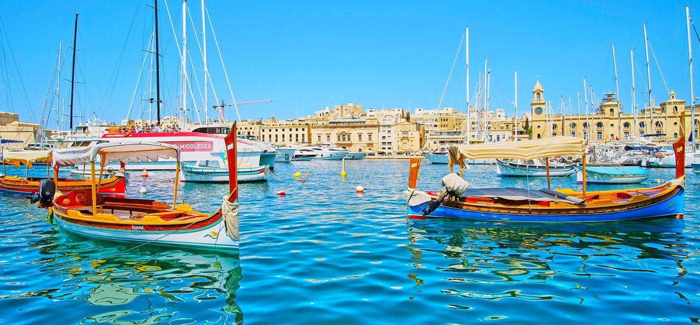 Image: Maltese Fishing boats on the Birgu waterfront (Photo Credit: Malta Tourism Authority)