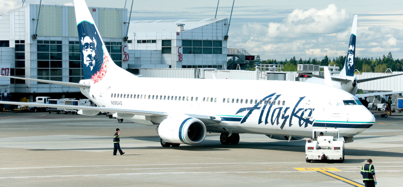 Image: Alaska Airlines plane at Seattle-Tacoma International Airport. (photo via 400tmax/iStock Unreleased)