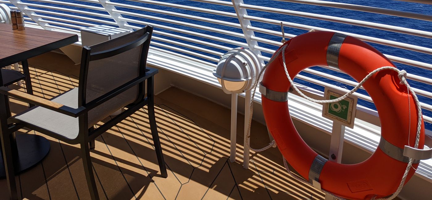Image: Chair and table on a cruise ship deck (photo by Eric Bowman)