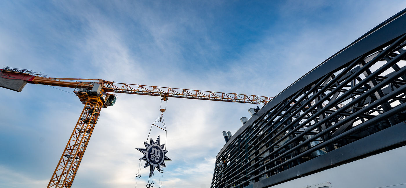 Image: The MSC Cruises logo is installed onto the new ship MSC World America (Photo Credit: MSC Cruises)