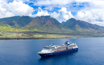 Celebrity Millennium sailing near the mountains of Hawaii.