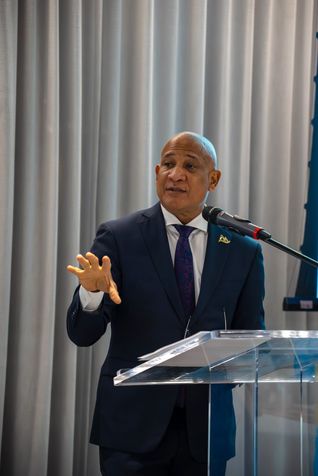 Ernest Hilaire speaking at diaspora hosted event in Toronto