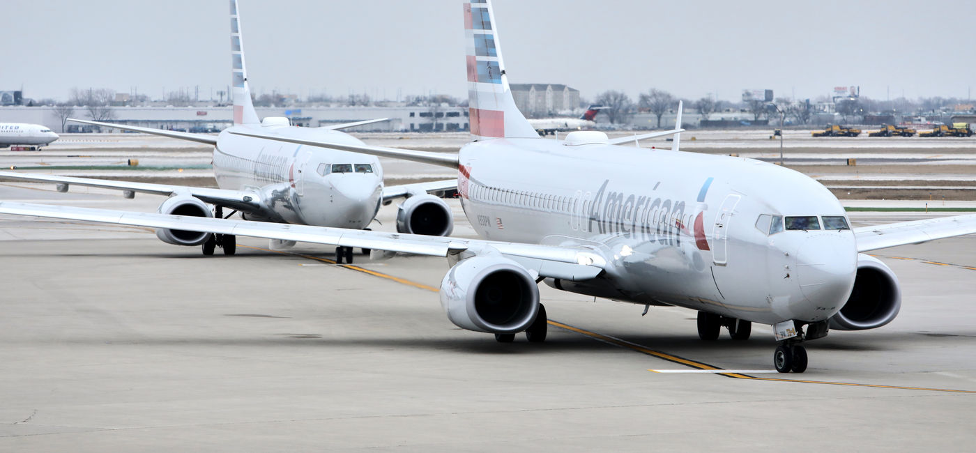 Image: Two American Airlines aircraft taxi on the runway. (Photo Credit: American Airlines)