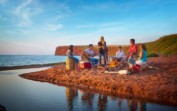 A family campfire on the beach in PEI