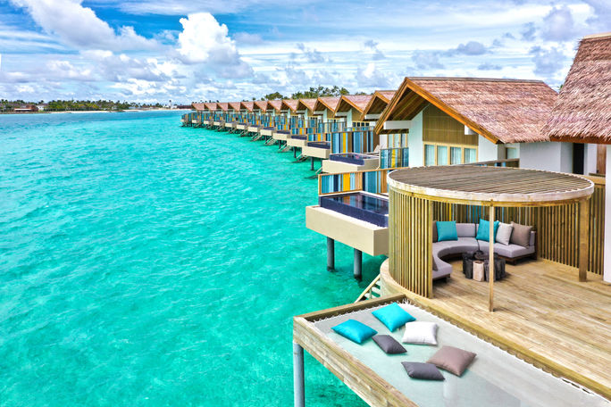 Overwater bungalows on turqupoise lagoon