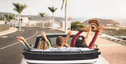 Group of young people going on a road trip.