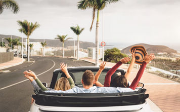 Group of young people going on a road trip.