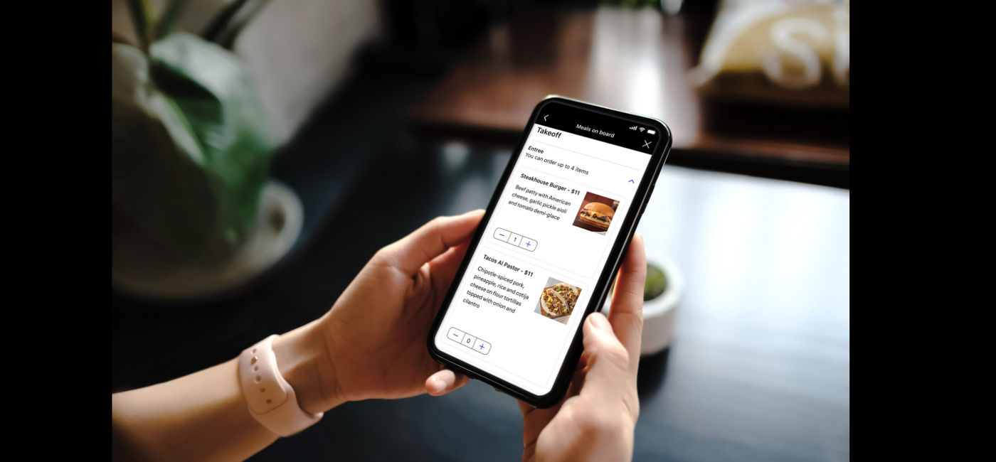 Image: Burgers, sandwiches, snack boxes and more available for purchase on united.com and the mobile app. (Photo Credit: United Airlines)