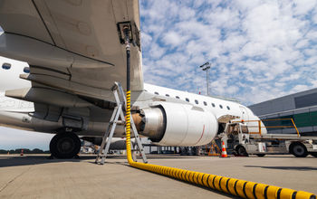 Plane being refueled before a flight.
