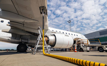 Plane being refueled before a flight.