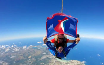 Carnival Cruise Line President Christine Duffy will tandem skydive in support of hurricane relief efforts.