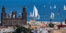The Cathedral of Santa Ana in the historic Vegueta quarter, with sailing boats off the coast of Las Palmas