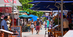 Tourists stroll through a market on Isla Mujeres, Quintana Roo, Mexico.