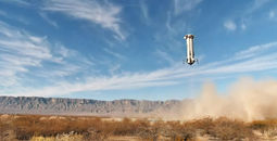 The New Shepard booster nears touchdown.