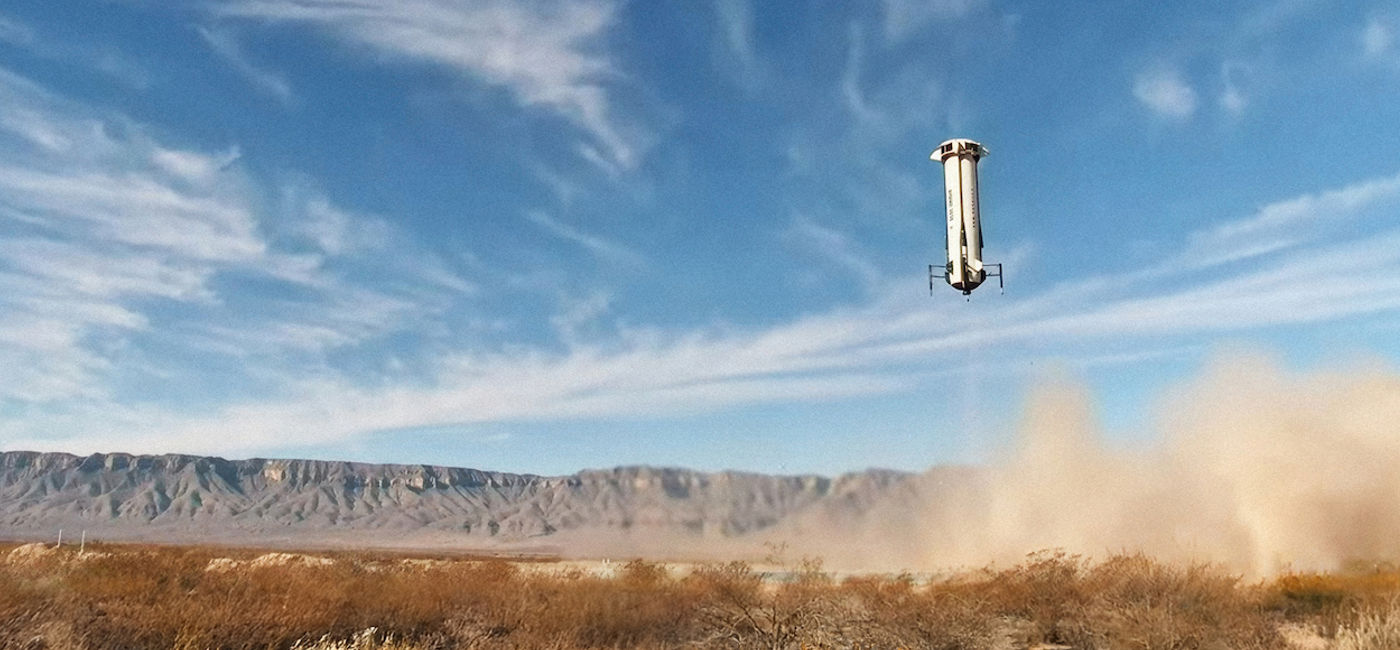 Image: The New Shepard booster nears touchdown. (Photo Credit: Blue Origin Media)